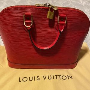 LOUIS VUITTON ALMA EPI HANDBAG
